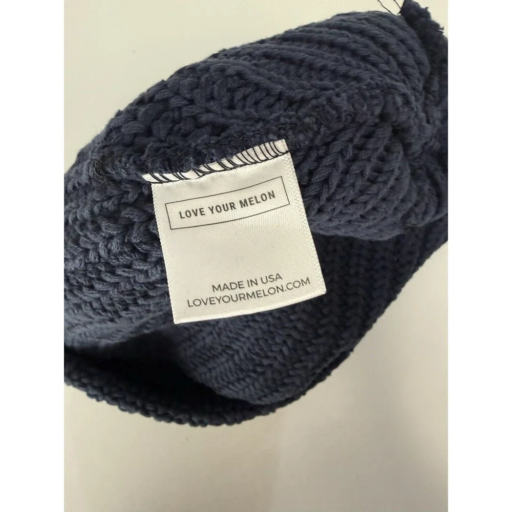 Love Your Melon Navy Solid Knit Beanie Hat One Size Celtic Knot Logo Accent